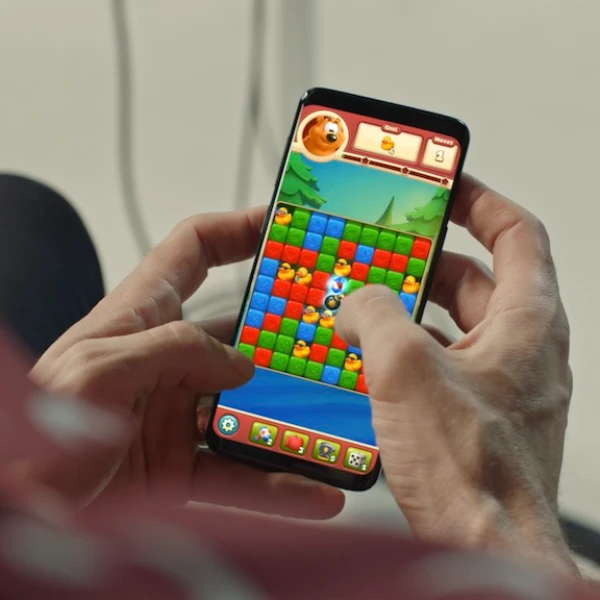 Which celebrities will appear in mobile game advertisements this year?