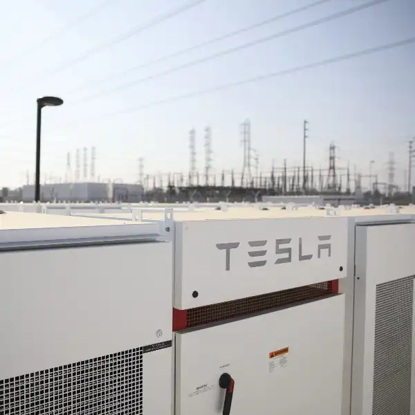 How much will Tesla's energy business grow before 2027? prediction market